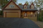 Newly Paved Driveway with Ample Parking and 2 Vehicle Garage
